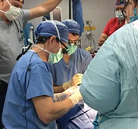 Dr. Lewis and Dr. Carrere performing surgery in Guatemala